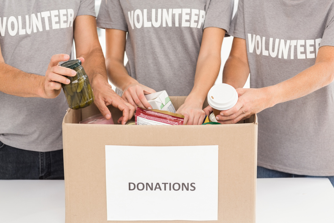 Volunteers sorting donations